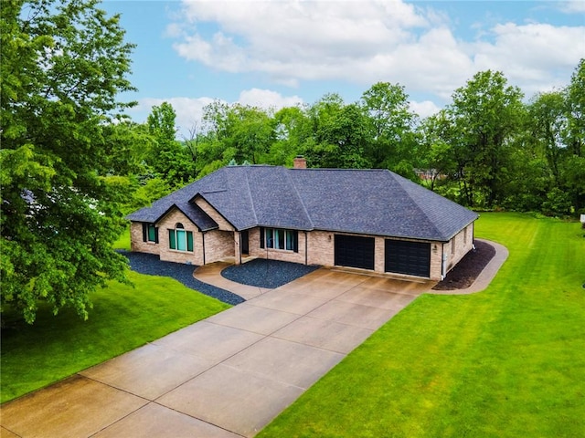 118 Summerlin Dr, Shenango Twp Law, PA 16101 - view of front facade featuring a garage, a front lawn, roof with shingles, a chimney, and concrete driveway