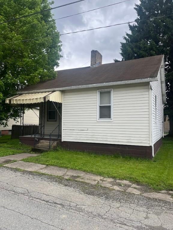 116 Third St, West Bethlehem, PA 15368 - view of home's exterior featuring a chimney