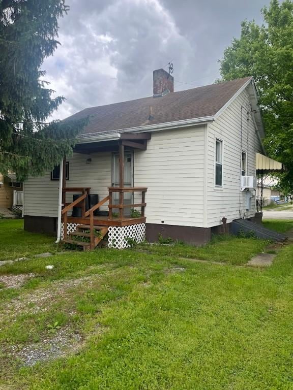 116 Third St, West Bethlehem, PA 15368 - back of house featuring a chimney and a lawn