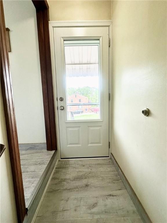 1425 Elgin, Aliquippa, PA 15001 - doorway featuring light wood finished floors and baseboards