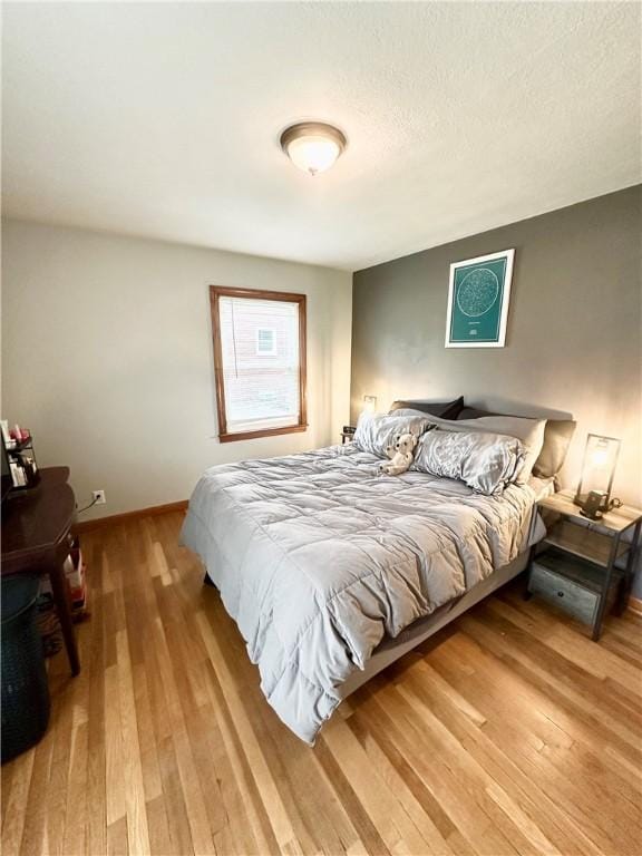 1425 Elgin, Aliquippa, PA 15001 - bedroom with hardwood / wood-style floors and baseboards
