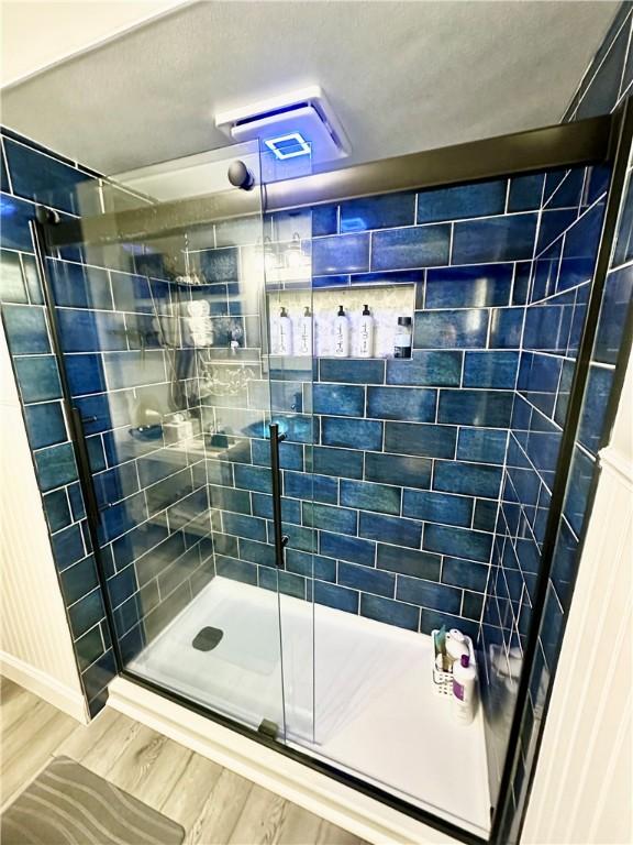 1425 Elgin, Aliquippa, PA 15001 - full bathroom featuring wood finished floors and a stall shower