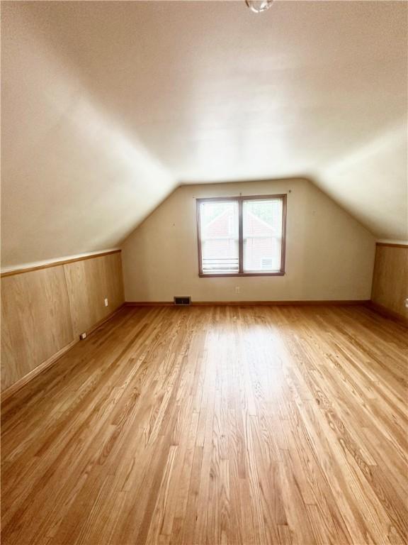 1425 Elgin, Aliquippa, PA 15001 - bonus room featuring light wood finished floors and vaulted ceiling