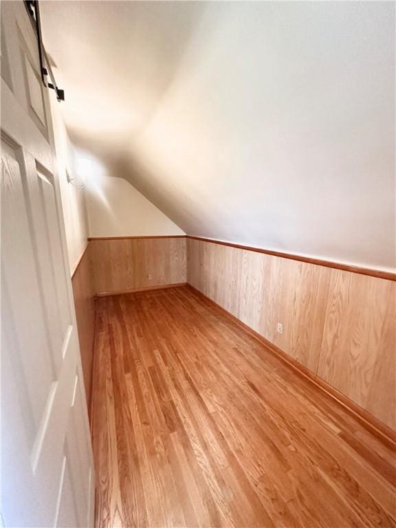 1425 Elgin, Aliquippa, PA 15001 - bonus room featuring light wood-type flooring, lofted ceiling, and wood walls