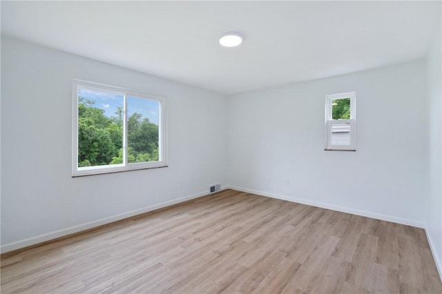 55 Lawrence St, Shaler, PA 15209 - empty room featuring light wood-style floors and baseboards