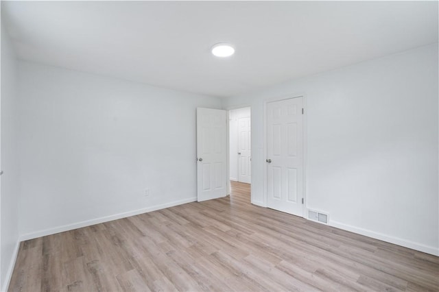 55 Lawrence St, Shaler, PA 15209 - spare room with wood finished floors and baseboards
