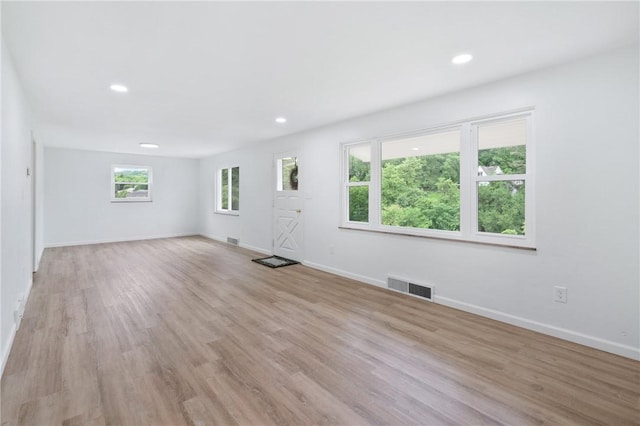 55 Lawrence St, Shaler, PA 15209 - unfurnished living room featuring recessed lighting, baseboards, and light wood-style floors
