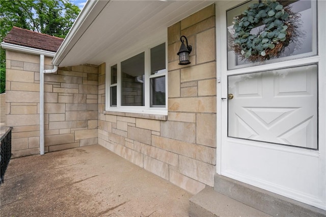 55 Lawrence St, Shaler, PA 15209 - view of exterior entry with covered porch and stone siding