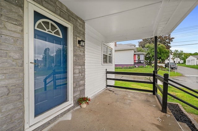 425 Routh Dr, Monroeville, PA 15146 - property entrance featuring covered porch, a yard, and stone siding