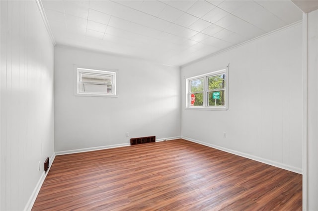 425 Routh Dr, Monroeville, PA 15146 - spare room with crown molding, wood finished floors, and baseboards