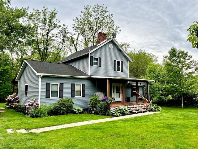 2513 Old Rte 18, New Beaver Boro, PA 16157 - view of front of home with a chimney, covered porch, a front yard, and roof with shingles