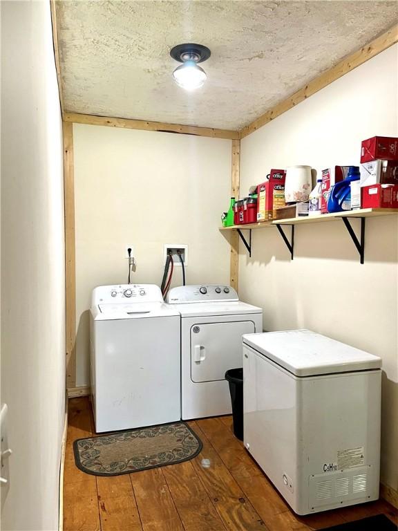 2513 Old Rte 18, New Beaver Boro, PA 16157 - laundry room with washer and dryer and hardwood / wood-style floors