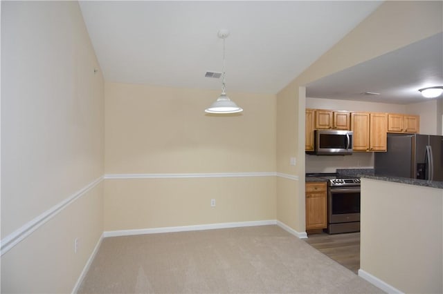 1201 Lenox Oval, Ross Twp, PA 15237 - kitchen featuring appliances with stainless steel finishes, dark countertops, pendant lighting, baseboards, and light carpet