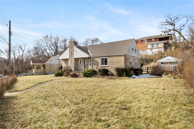 828 Georgia Ave, Bon Air, PA 15210 - rear view of property with a chimney, brick siding, and roof with shingles