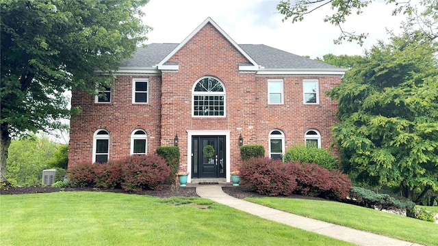 229 Guckert Ln, Marshall, PA 15090 - colonial inspired home featuring a front lawn, brick siding, and a shingled roof