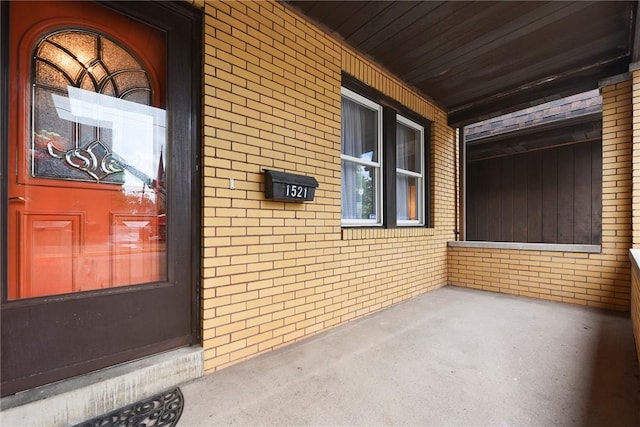 1521 Claim St, Troy Hill, PA 15212 - property entrance featuring brick siding and covered porch