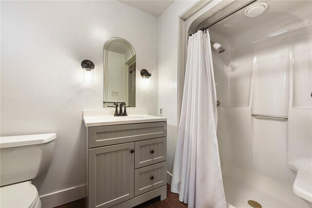 1521 Claim St, Troy Hill, PA 15212 - bathroom featuring toilet, a shower with shower curtain, vanity, and baseboards