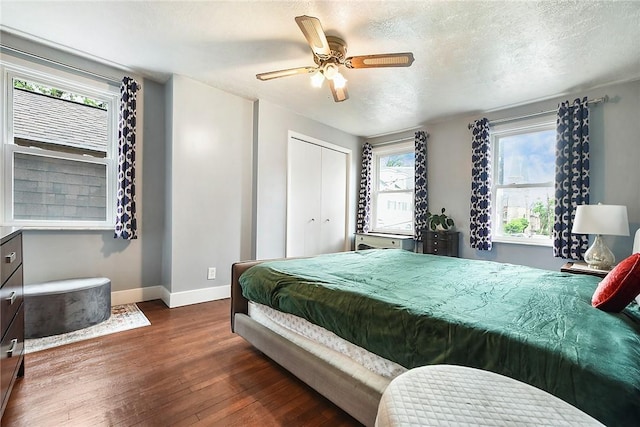 1521 Claim St, Troy Hill, PA 15212 - bedroom with baseboards, hardwood / wood-style flooring, multiple windows, and ceiling fan
