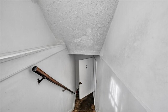 1303 Alton St, Beechview, PA 15216 - stairs with a textured ceiling