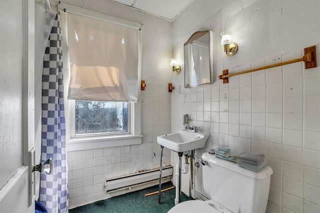 1303 Alton St, Beechview, PA 15216 - bathroom with baseboard heating, tile walls, toilet, and a shower with curtain