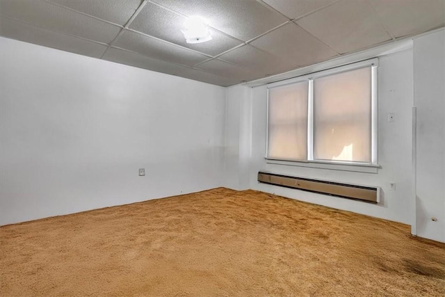 1303 Alton St, Beechview, PA 15216 - spare room with carpet flooring, a baseboard radiator, and a drop ceiling