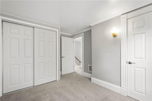 548 Conrad Ave, Charleroi Boro, PA 15022 - unfurnished bedroom with carpet floors, a closet, crown molding, and baseboards