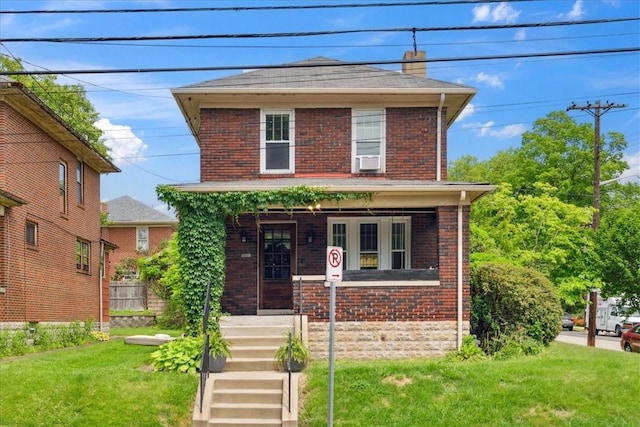 5465 Coral St, Friendship Park, PA 15206 - traditional style home with brick siding, a porch, a chimney, and a front yard