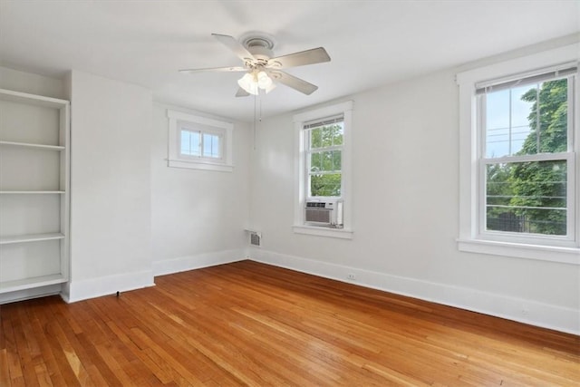 5465 Coral St, Friendship Park, PA 15206 - unfurnished room with light wood finished floors, baseboards, a ceiling fan, and cooling unit