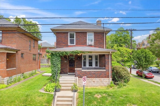 5465 Coral St, Friendship Park, PA 15206 - american foursquare style home with brick siding, a front lawn, covered porch, and cooling unit