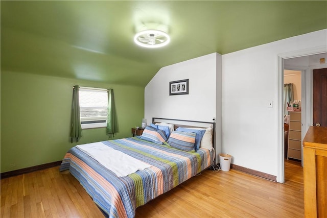 1415 Oakglen St, Crafton Heights, PA 15204 - bedroom featuring light wood-style flooring, baseboards, and vaulted ceiling