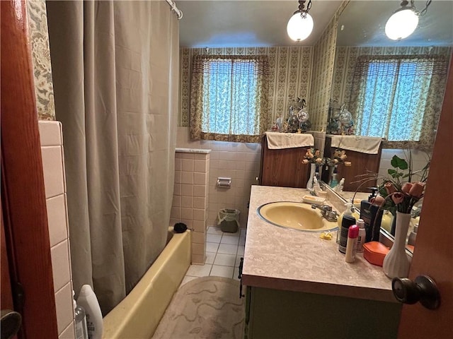 42 Walnut Ave, Dunbar, PA 15431 - full bath featuring tile walls, vanity, shower / tub combo with curtain, tile patterned flooring, and plenty of natural light