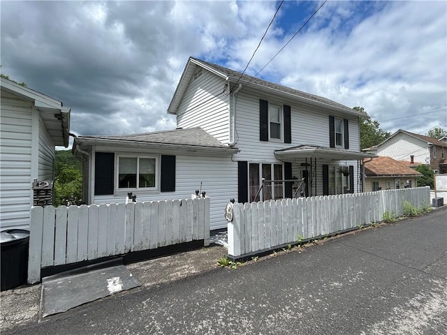 42 Walnut Ave, Dunbar, PA 15431 - view of front of house featuring a shingled roof and cooling unit