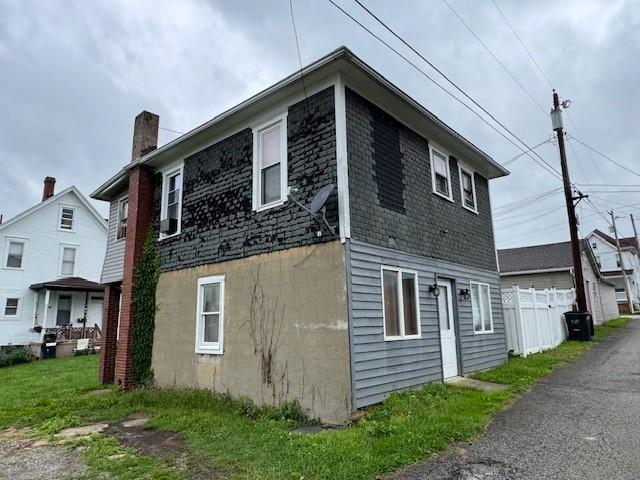 705 Green St, Southwest Greensburg, PA 15601 - view of home's exterior with a chimney