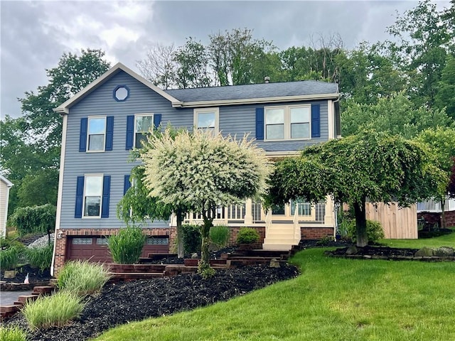 758 Venango Ave, Shaler, PA 15209 - view of front of home with brick siding, a front yard, and a garage