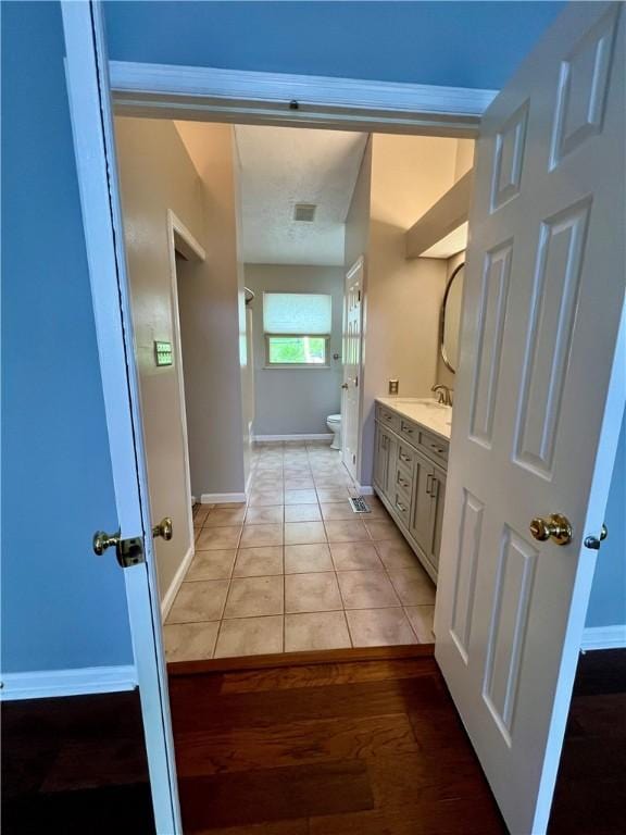 758 Venango Ave, Shaler, PA 15209 - full bath featuring toilet, vanity, baseboards, and tile patterned flooring