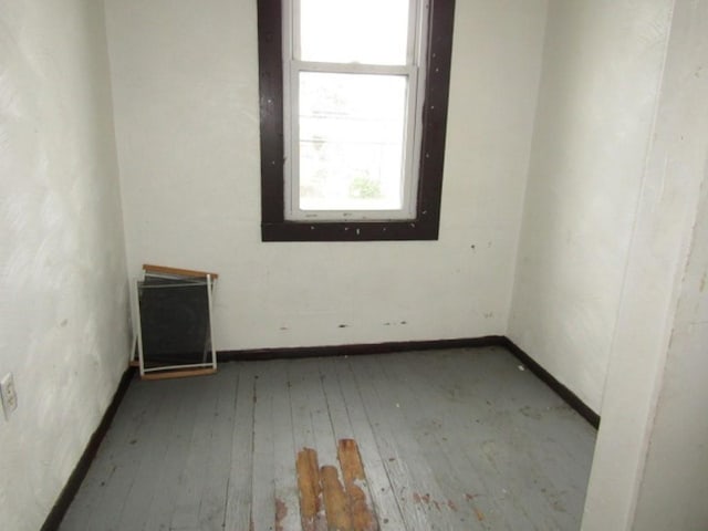 1433 Arlington Ave, Arlington, PA 15210 - spare room with hardwood / wood-style flooring and baseboards