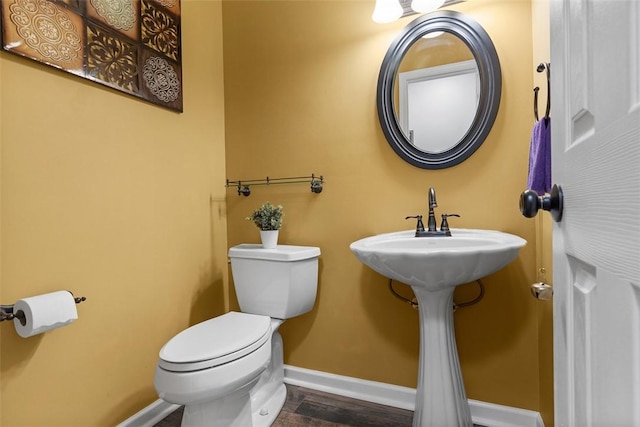 14 Cinque Terra Pl, Finleyville, PA 15332 - half bathroom featuring baseboards, toilet, and wood finished floors