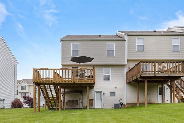14 Cinque Terra Pl, Finleyville, PA 15332 - rear view of property featuring stairway, a wooden deck, a lawn, and central AC unit