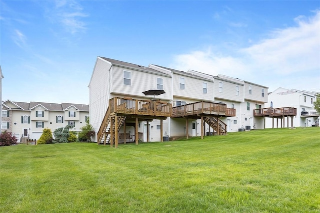 14 Cinque Terra Pl, Finleyville, PA 15332 - back of house featuring stairway, a wooden deck, and a residential view