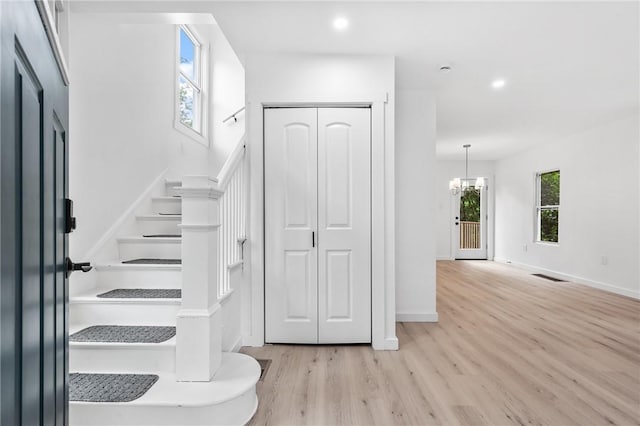36 W Bellecrest, Brentwood, PA 15227 - staircase with wood finished floors, plenty of natural light, a chandelier, recessed lighting, and baseboards