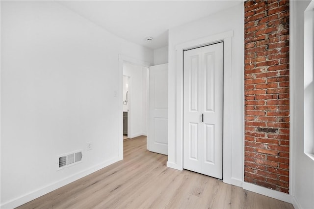 36 W Bellecrest, Brentwood, PA 15227 - unfurnished bedroom with light wood-style flooring, baseboards, and a closet