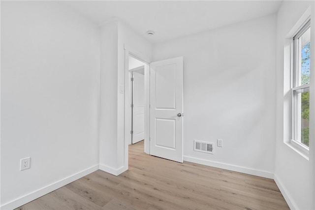 36 W Bellecrest, Brentwood, PA 15227 - empty room featuring wood finished floors, baseboards, and healthy amount of natural light