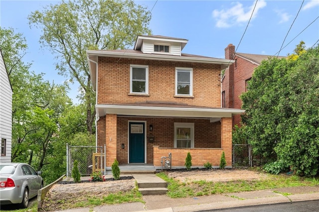 36 W Bellecrest, Brentwood, PA 15227 - traditional style home featuring covered porch, brick siding, and a gate