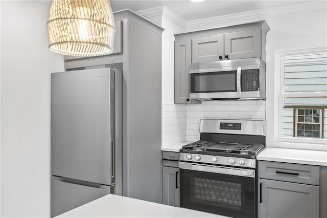36 W Bellecrest, Brentwood, PA 15227 - kitchen featuring appliances with stainless steel finishes, gray cabinetry, decorative backsplash, ornamental molding, and a chandelier