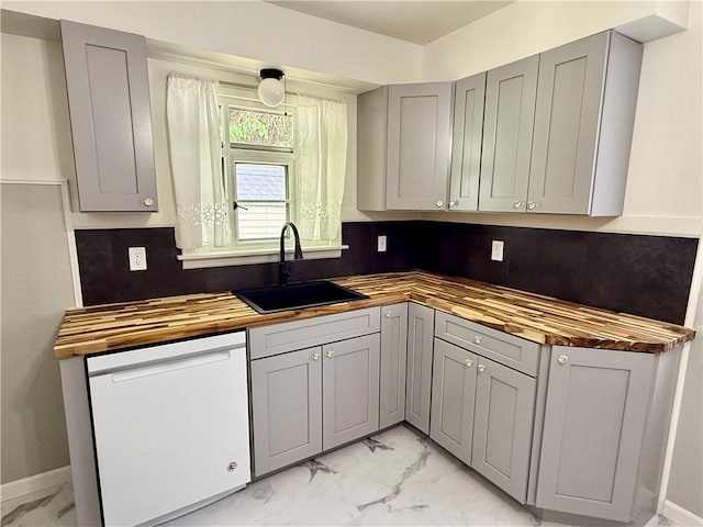 413 Days Run Rd, East Deer, PA 15030 - kitchen featuring butcher block countertops, light marble finish floors, a sink, and dishwasher