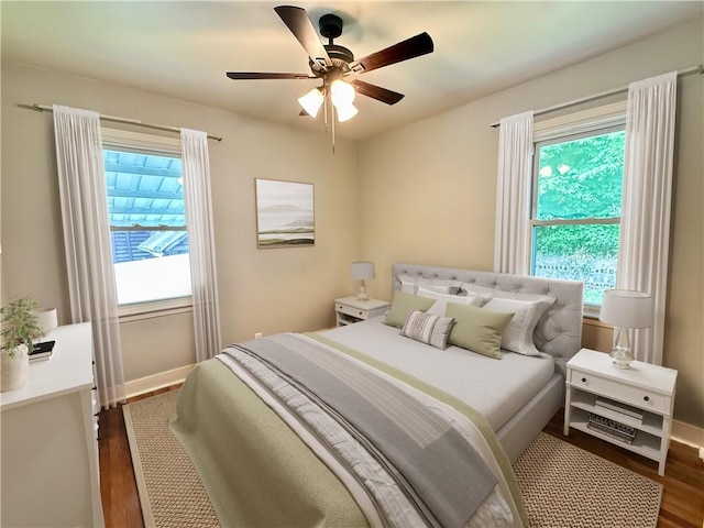 413 Days Run Rd, East Deer, PA 15030 - bedroom with dark wood-style flooring, multiple windows, and baseboards