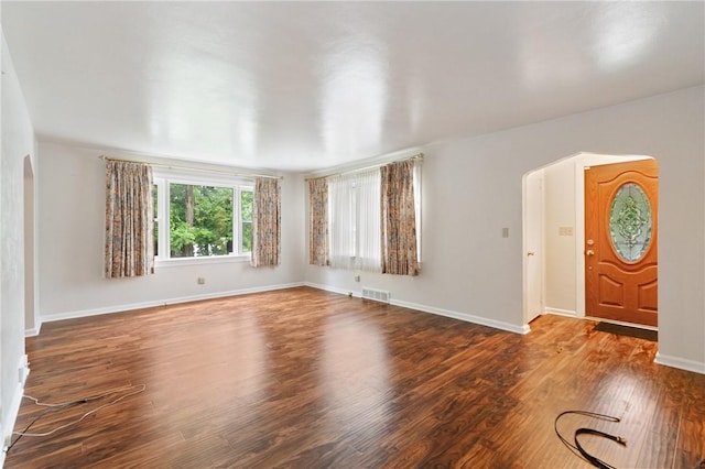 2501 Middletown Rd, Ingram, PA 15205 - entryway with arched walkways, wood finished floors, and baseboards
