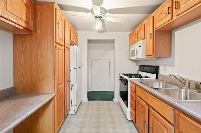 2501 Middletown Rd, Ingram, PA 15205 - kitchen with white appliances, light floors, a sink, ceiling fan, and light countertops