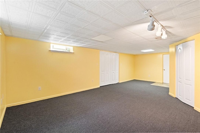 2501 Middletown Rd, Ingram, PA 15205 - basement featuring rail lighting, baseboards, and dark colored carpet