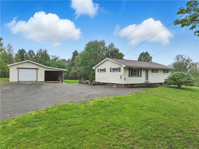 124 Plum St, Franklin Twp, PA 16117 - view of front facade with an outbuilding, a front yard, a detached garage, and driveway